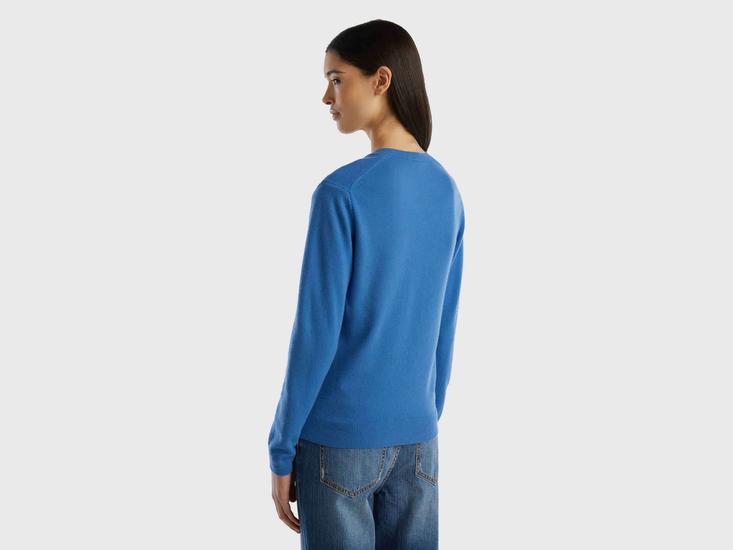 Blue V-neck sweater in pure Merino wool - Blue | Benetton