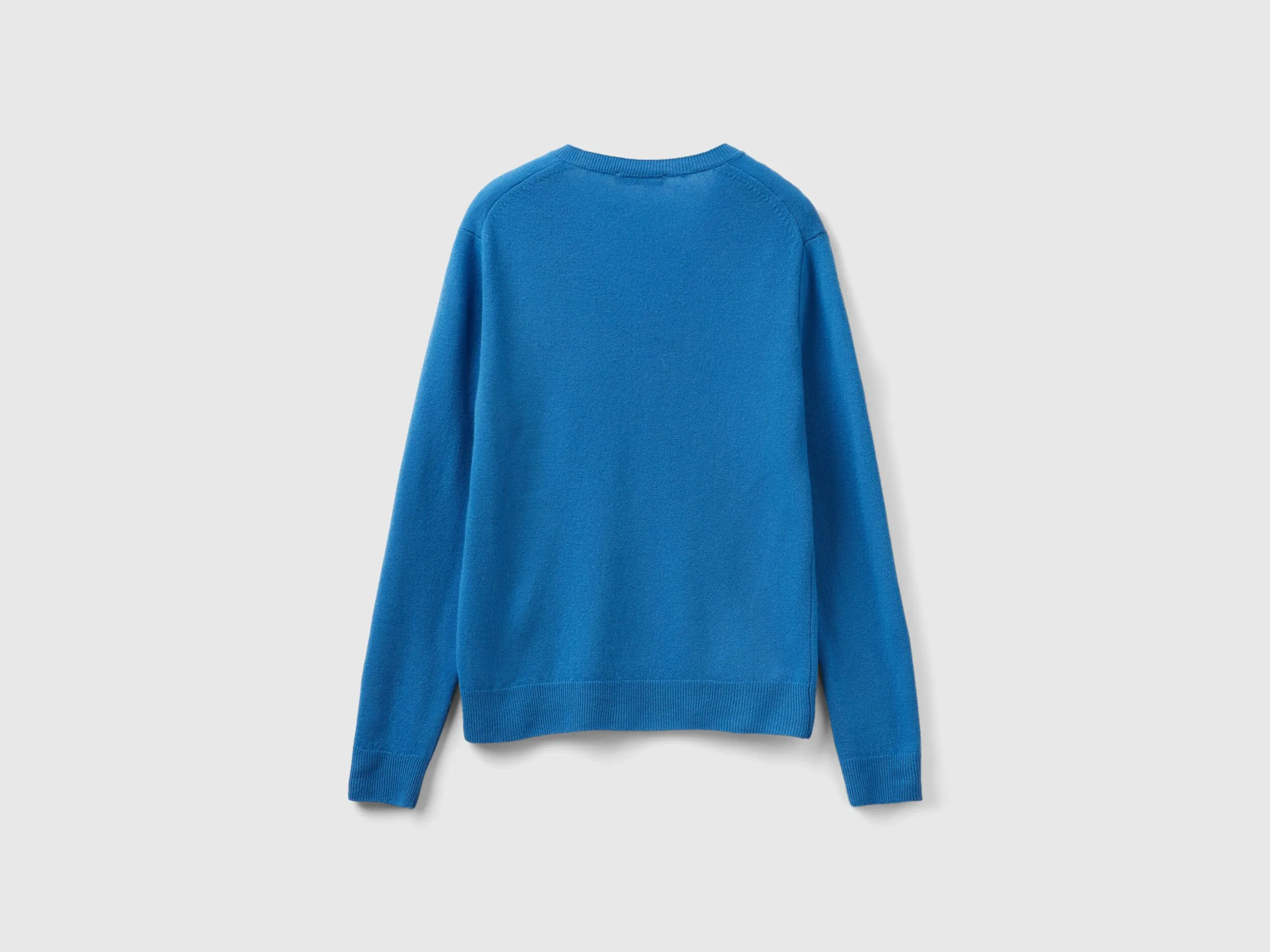 Blue V-neck sweater in pure Merino wool - Blue | Benetton