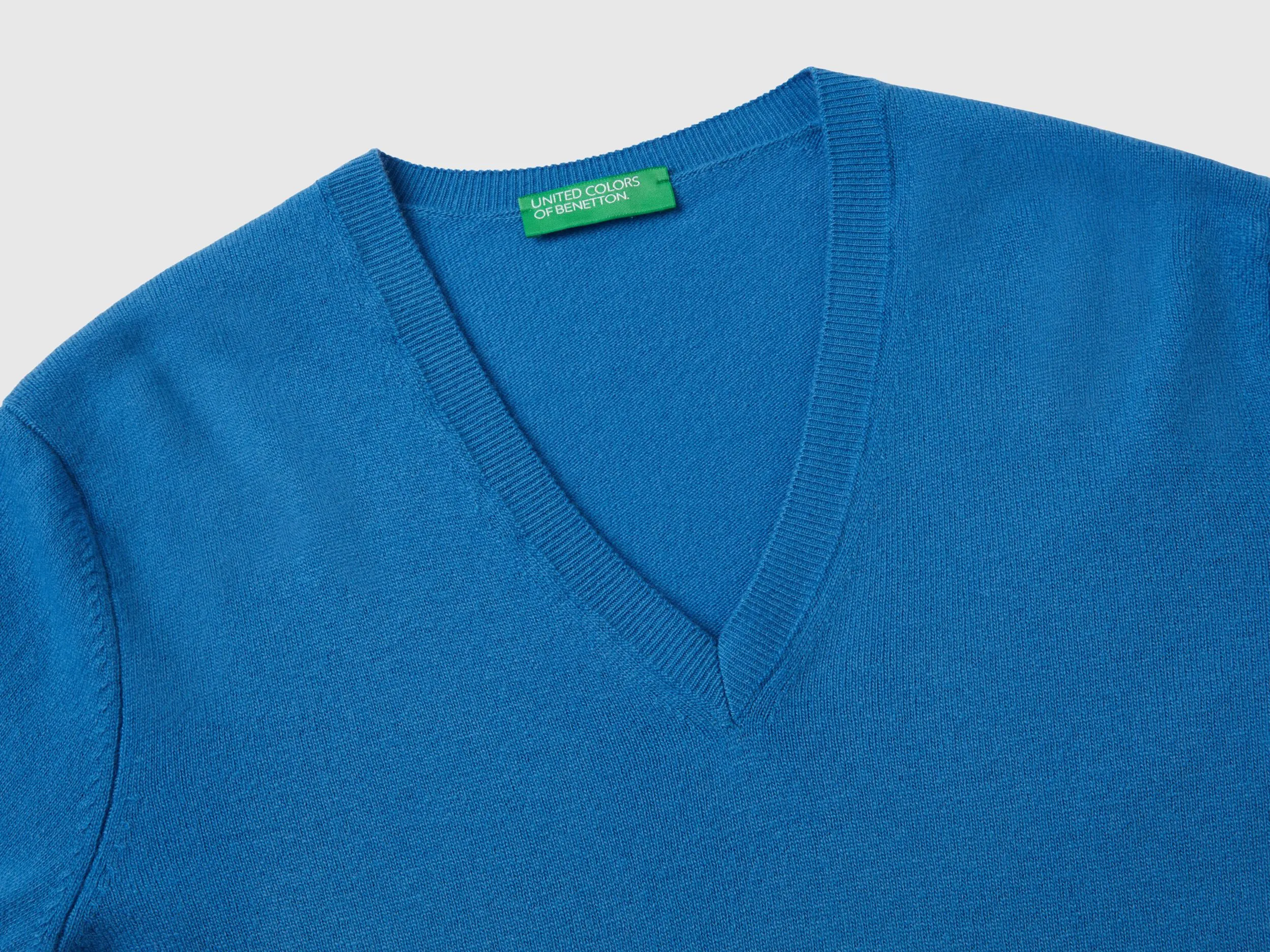 Blue V-neck sweater in pure Merino wool - Blue | Benetton