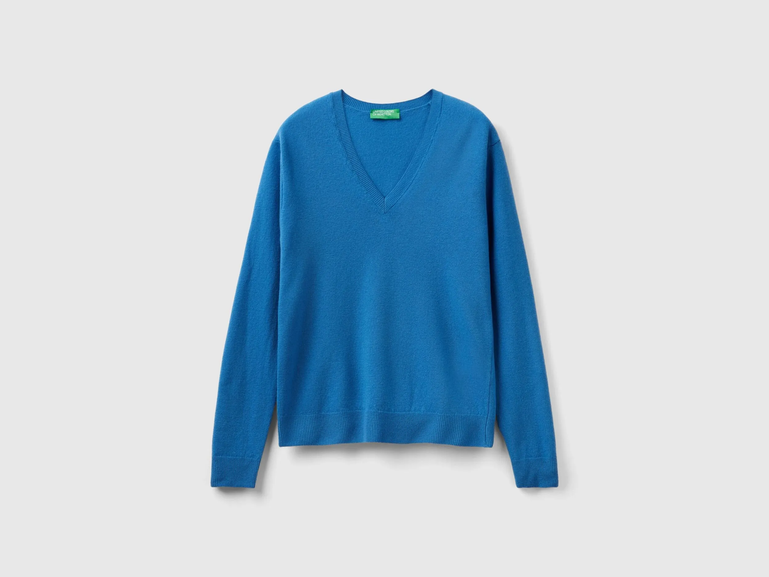 Blue V-neck sweater in pure Merino wool - Blue | Benetton