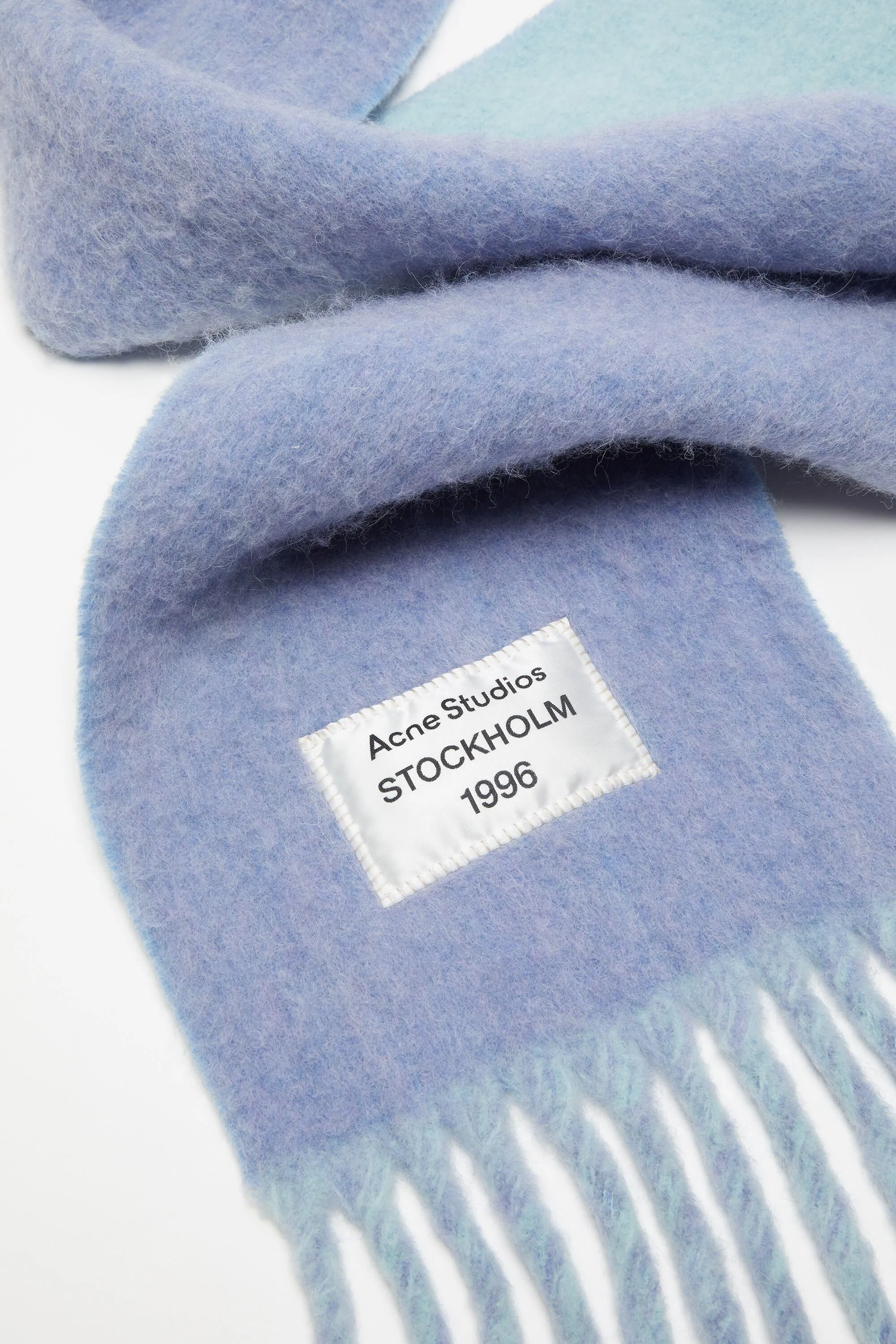 Fringed scarf logo label